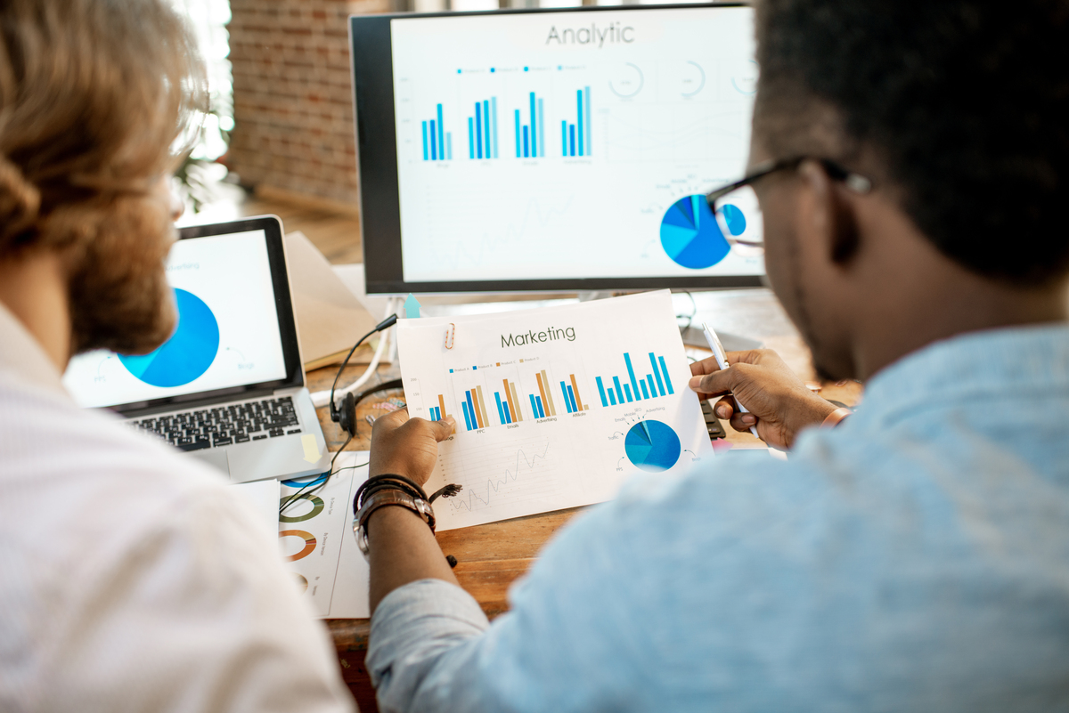 coworkers reviewing marketing data together