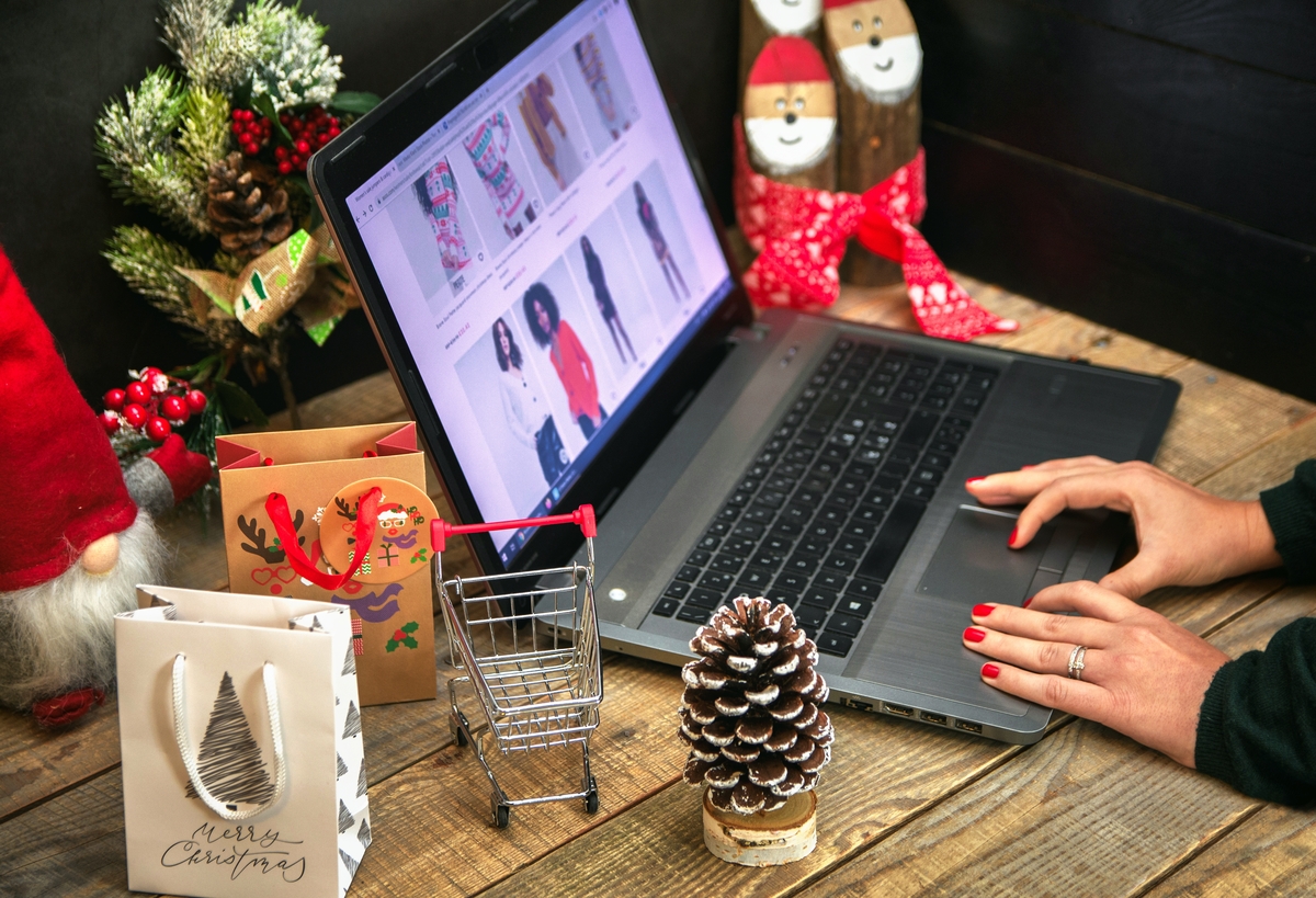 woman using laptop for online christmas shopping